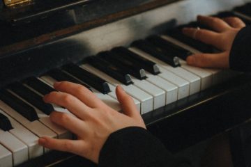 woman playing a piano